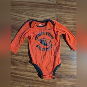 Nike Kids Bodysuit in Orange and Black